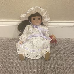 Porcelain Doll With Wind Up Music Box In Side
