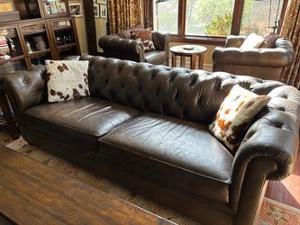 Pottery Barn tufted leather couches