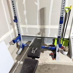 Bench And Olympic Bar With 45 Pound Steel Plates