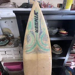 Surfboard And Wetsuit 