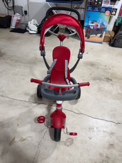 Radio Flyer 4-in-1 Stroll 'N Trike, Ages 1-5, Toddler Tricycle & Stroller, Foam Tires, Push Handle, UV Canopy, Removable Tray & Seatbelt
