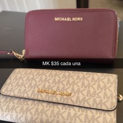 Mk Hand wallet $35
