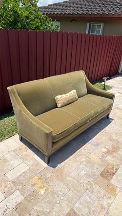 Large, comfortable olive green sofa