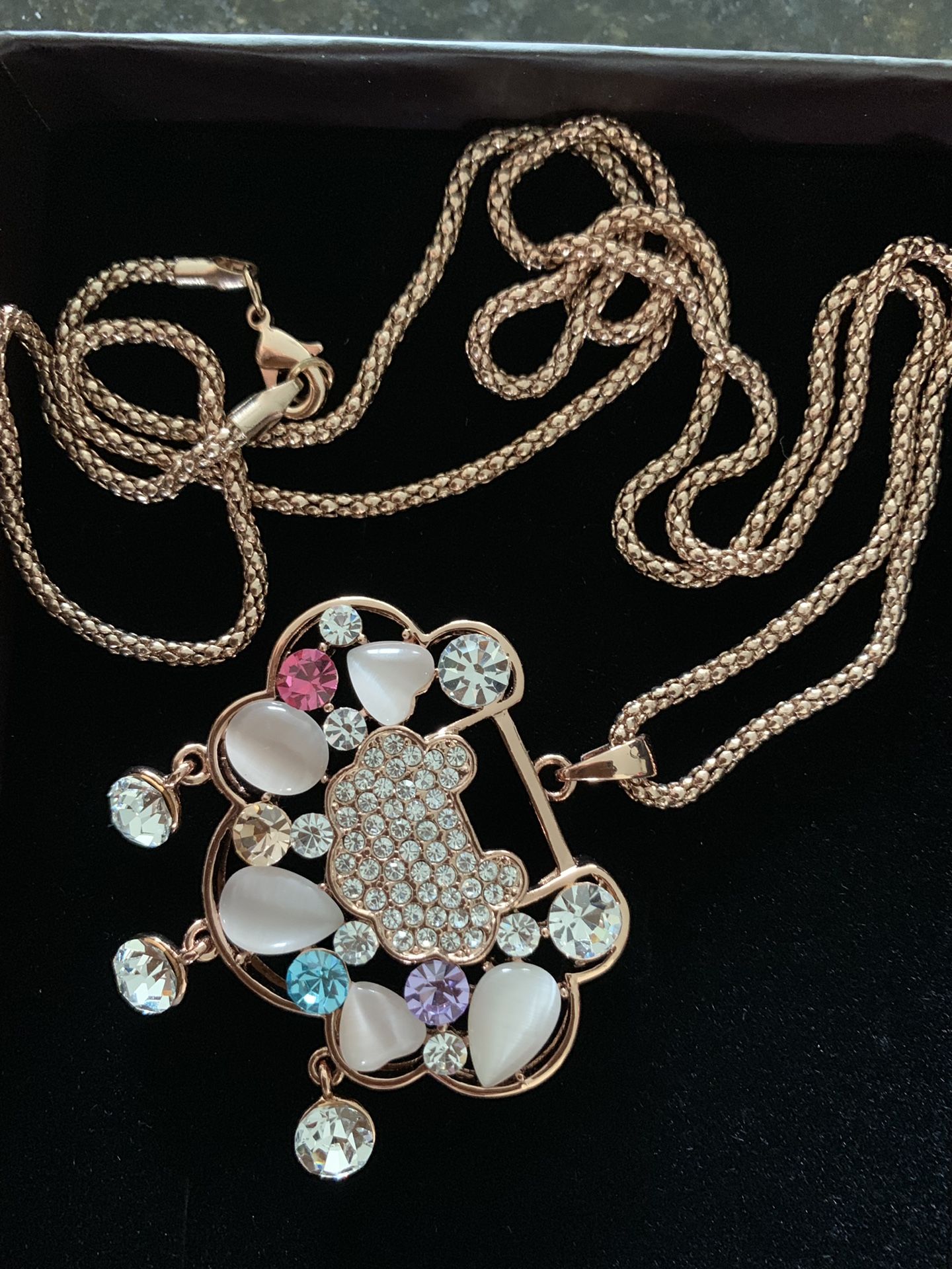 Gold tone crystal-accented sweater chain