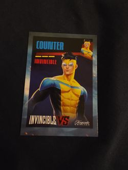 Invincible in his blue and yellow suit with sunglasses.