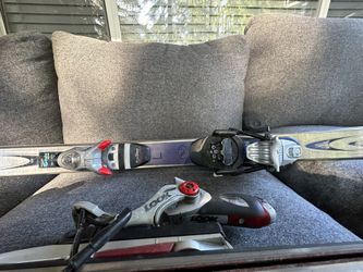 2 Pairs Of Skis