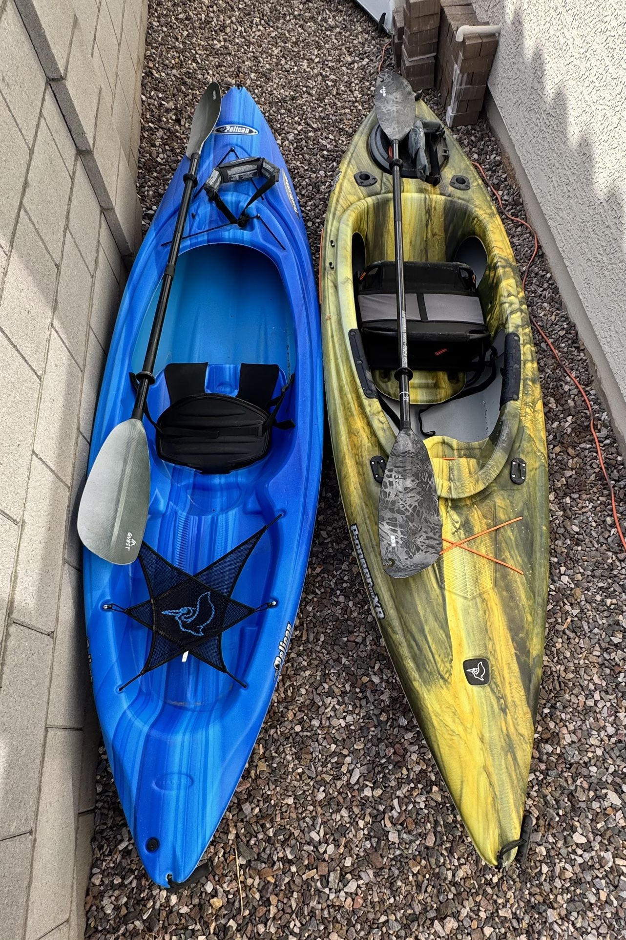 Two Kayaks w/ Paddles & Flotation Devices