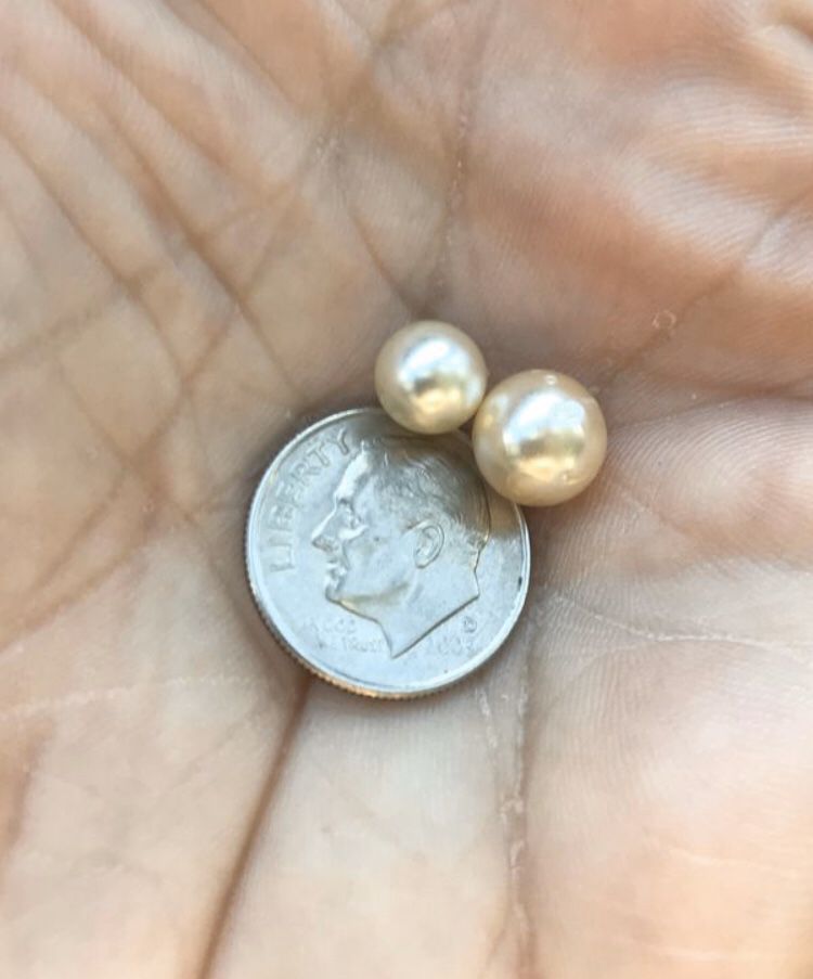 New. Natural pearls. Two sizes. These are authentic and real. I have a few in each size. One pearl for $25 and two for $35. Can be used to make
