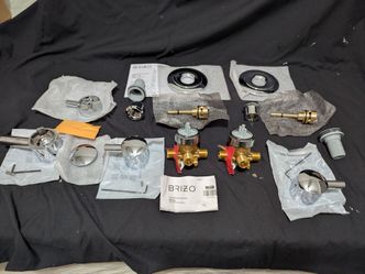 Plumbing -Brizo, 3 - Port, six function divider two of them, everything sold in photo?. Plumbing bathroom shower. Open boxes. New not used