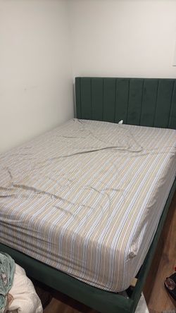 Green velvet bed frame and mattress
