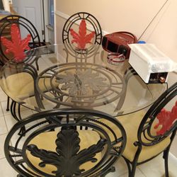 GLASS & WROUGHT IRON DINING TABLE WITH 4 CHAIRS 