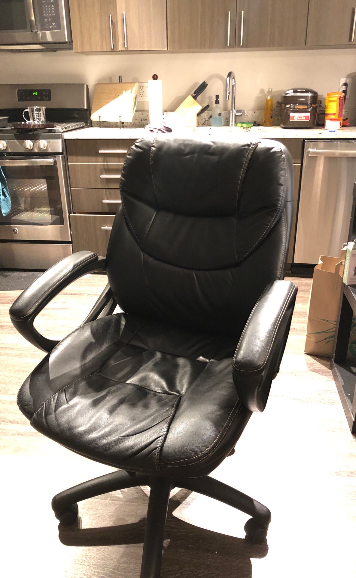 Ergonomic leather spinning chair business