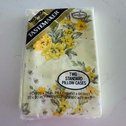 Vintage Tastemaker no iron Muslin two standard pillowcases set new in package unopened Yellow floral with greenery on a light yellow background I have