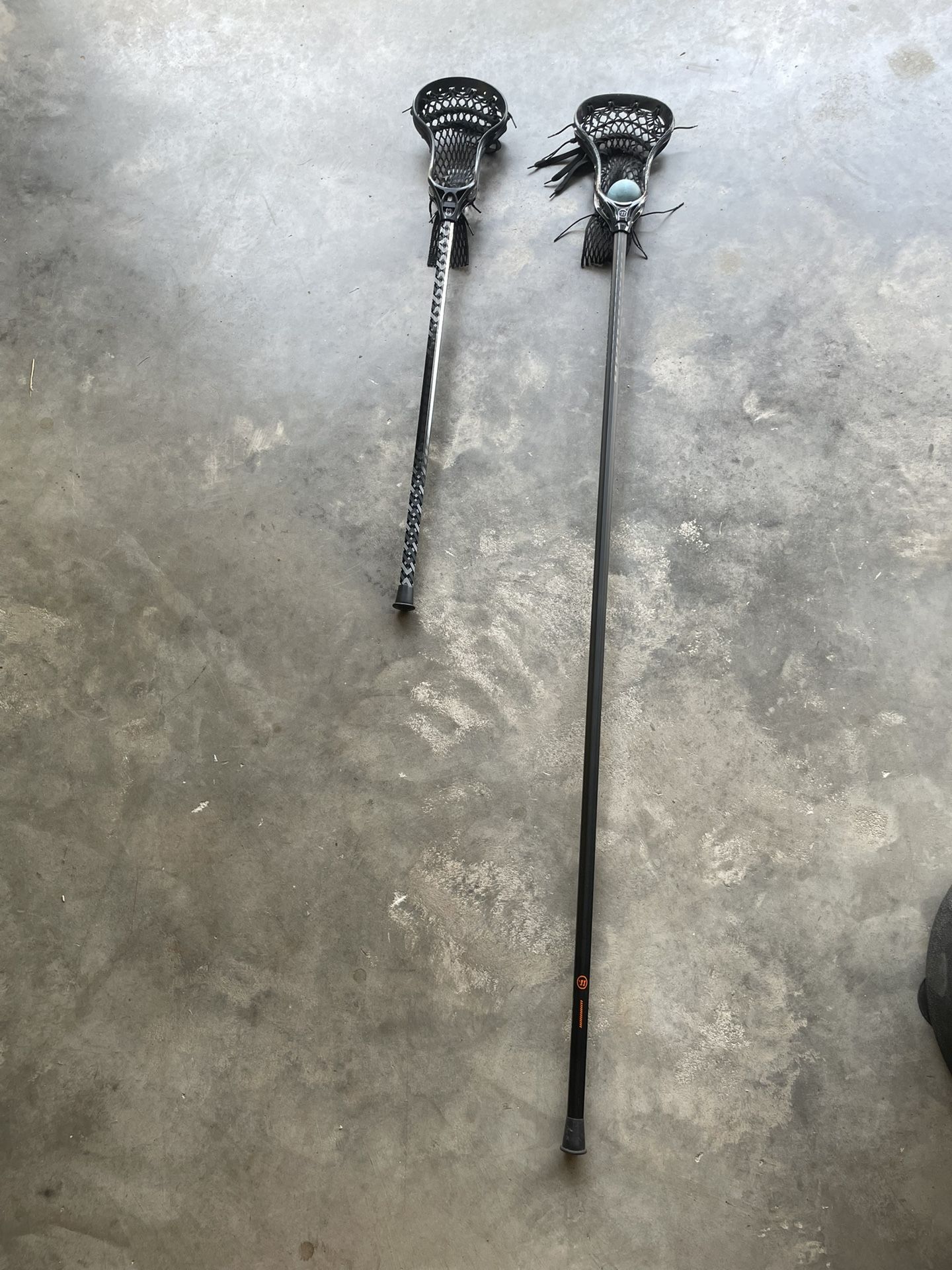 2 Lacrosse sticks and ball