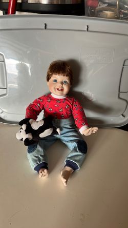 Porcelain Boy Doll with Stuffed Animal