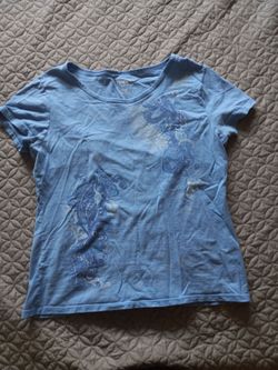 Blue shirt with blue & white accents