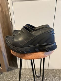 Givenchy logo-debossed leather slides Authentic