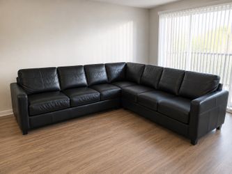 Black leather sectional sofa couch