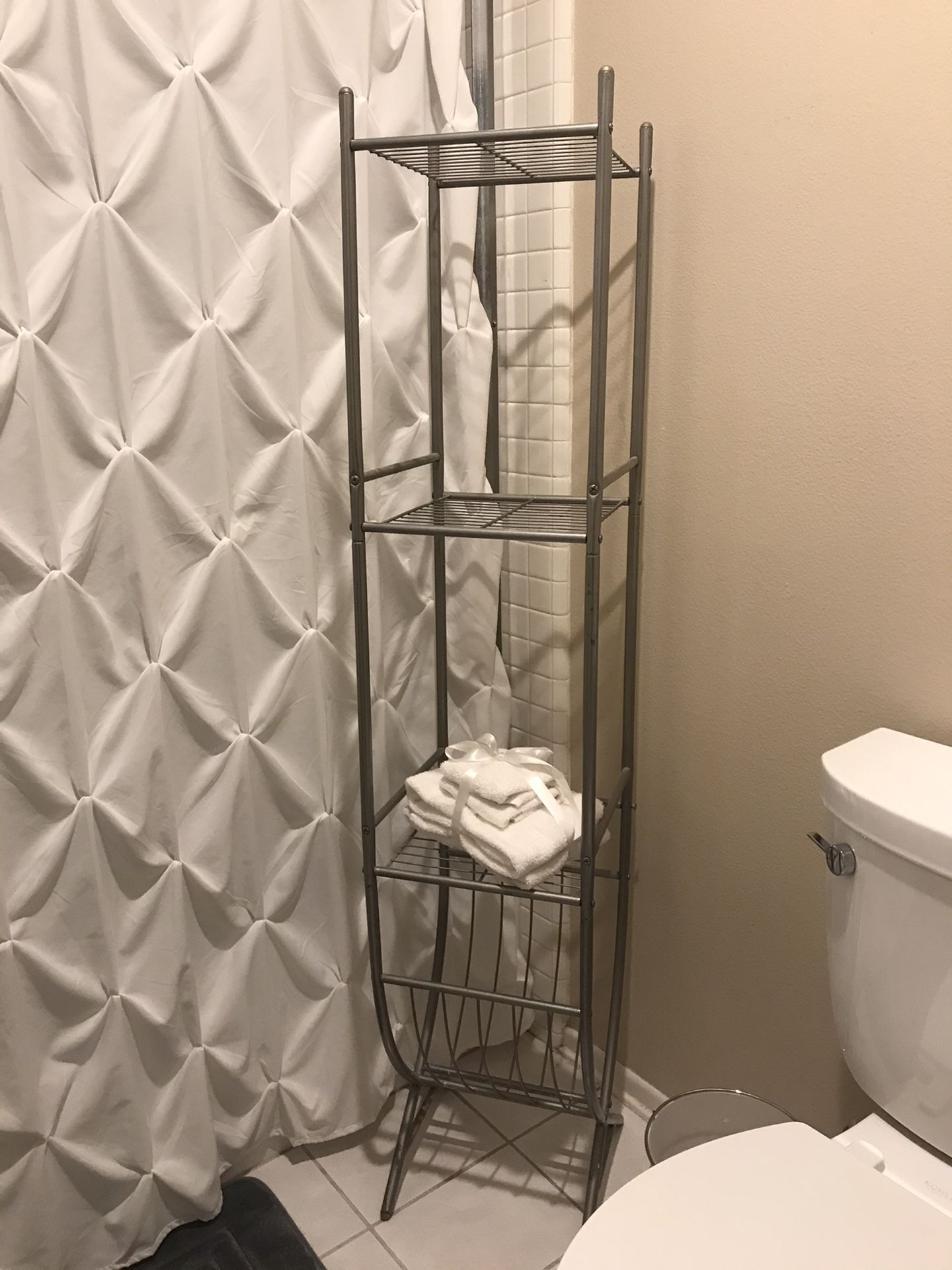 Silver bathroom organizing shelf