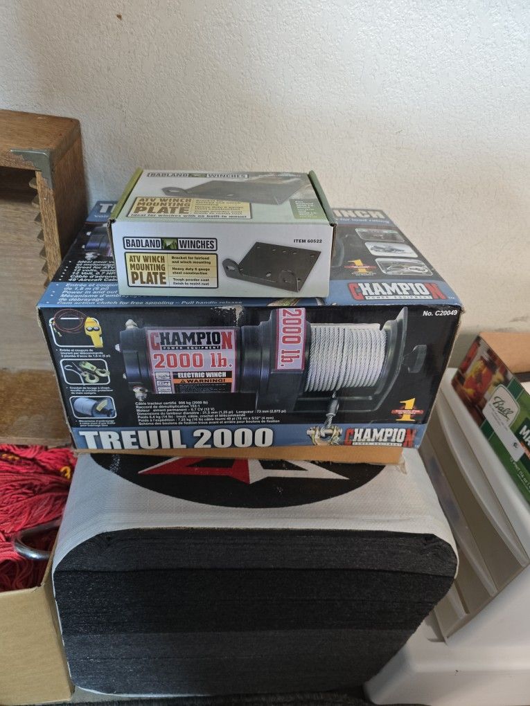 New Champion Winch 2000lb With Atv Winch Mount, New In Box $50
