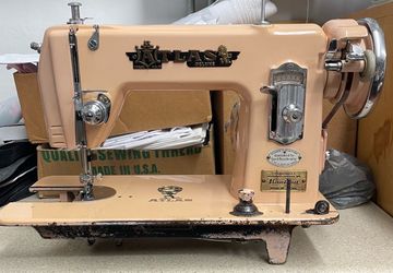 Antique “Pink Atlas Deluxe Precision Sewing Machine