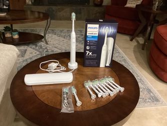 Philips Sonicare 4300 Power toothbrush and brush heads $55.00