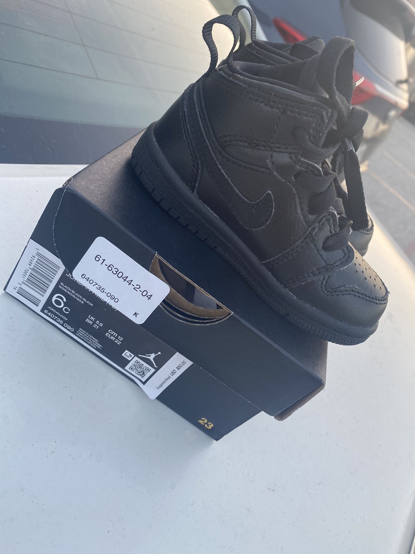 Jordan 1 mid Triple Black