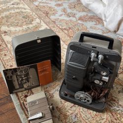 Vintage Bell & Howell Movie Camera And Projector