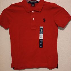 Boys size 6/7 red Polo shirt new $5 pick up in Edinburg no holds