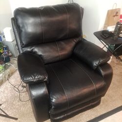 Black Leather powered recliner With USB Port $275  B/o