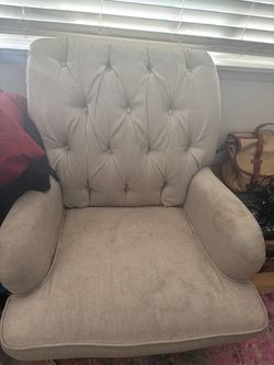 Tufted lounge chair with ottoman