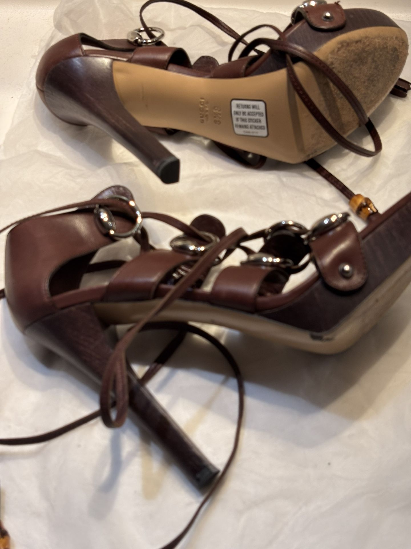 Gucci Gladiator 41/2 in. In brown, In great condition, size 38. Asking 300.00. Louis Vuitton is also Size 38 and also in great condition. Asking 350.