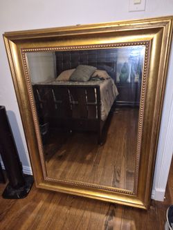 Large gold framed mirror