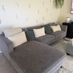 Living Spaces Gray 2 Piece Sectional Couch 112’