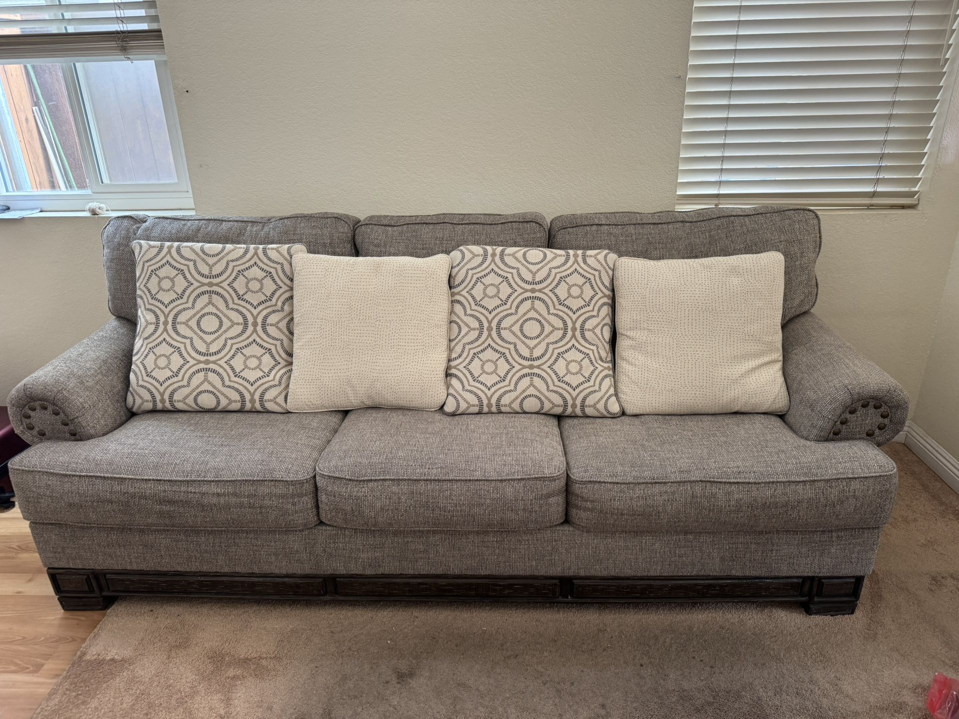 Gray Sofa with Patterned Cushions