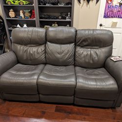 Grey Leather Electric Reclining Couch, WARRANTY 