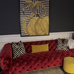 Stuffed red Couch & painting