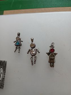 Three people charms 5.00 Each