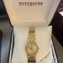 Ladies Gold Whittnauer watch 