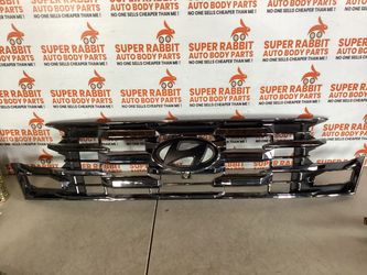 2025 Tucson Grille Dark w/camera hole CHEAPEST OEM 2026