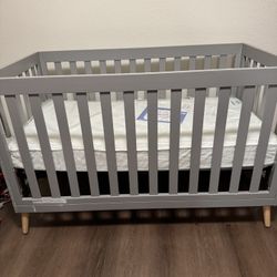 gray crib 