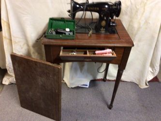 “Antique “       sewing machine    