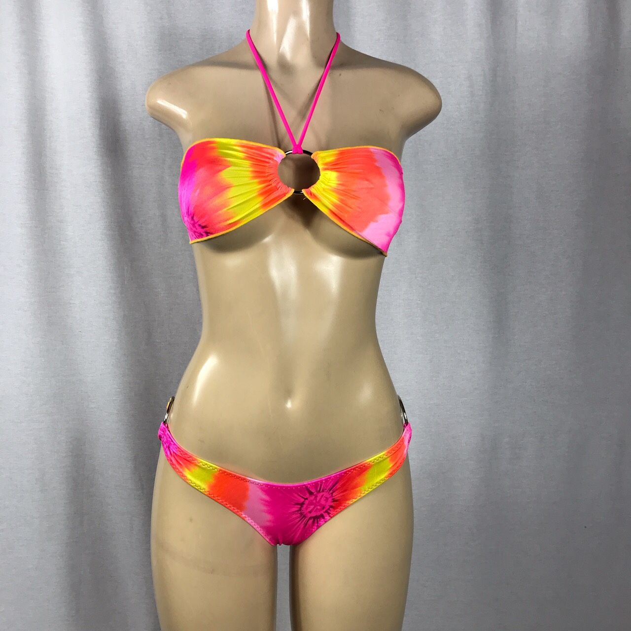 Zuliana Tye die Hot and Sexy bright yellow and pink cheeky style bikini with side metal rings.