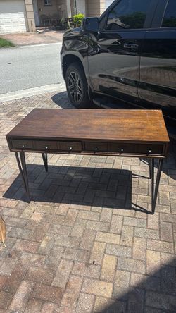 Wooden desk with metal legs
