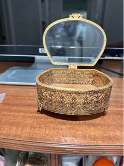 Vintage metal Jewelry Casket Beveled Glass Lid Gold Filigree Trinket Box Footed