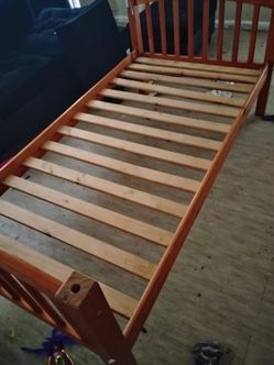 Twin wooden bed frame with 2 black n Decker kitchen appliances