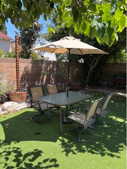 Patio furniture Table Chairs and umbrella