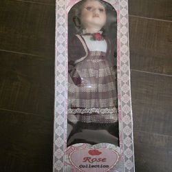 2 Rose Collection Porcelain Dolls
