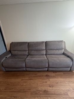 Auto recline electric sofa Living Spaces