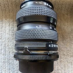 TAMRON 28-70 mm F/3.5-4.5 Standard Tele-Macro Zoom Lens. Camera